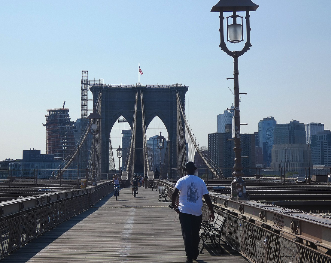 Cyclists and walkers sharing the approach to the Brooklyn Bridge