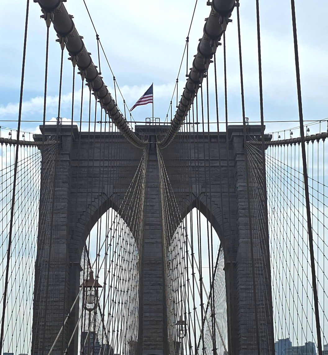 The steel suspender cables fanning from a Brooklyn Bridge tower