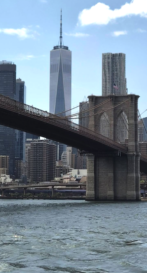 The Brooklyn Bridge towers framed against the New York skyline
