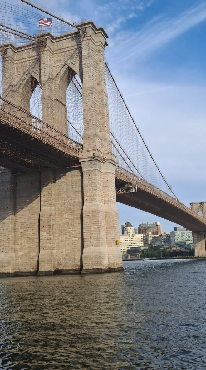 The Brooklyn Bridge stone towers and main span